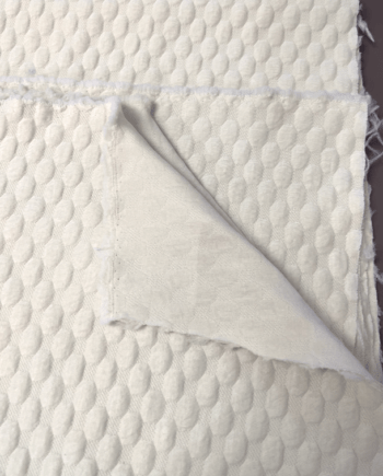 Acolchado crudo, tela en relieve