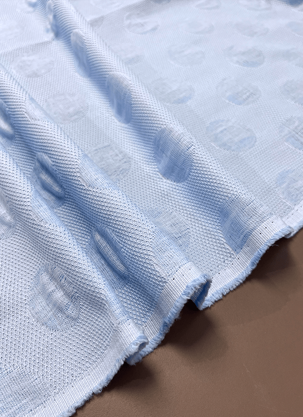 Jacquard azul piqué con lunares Jacquard azul piqué con lunares