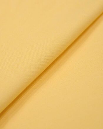 Tela oxford amarillo claro de algodón